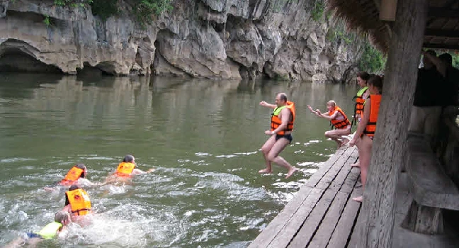 Erawan Waterfalls and Boat trip River Kwai Tour From Bangkok